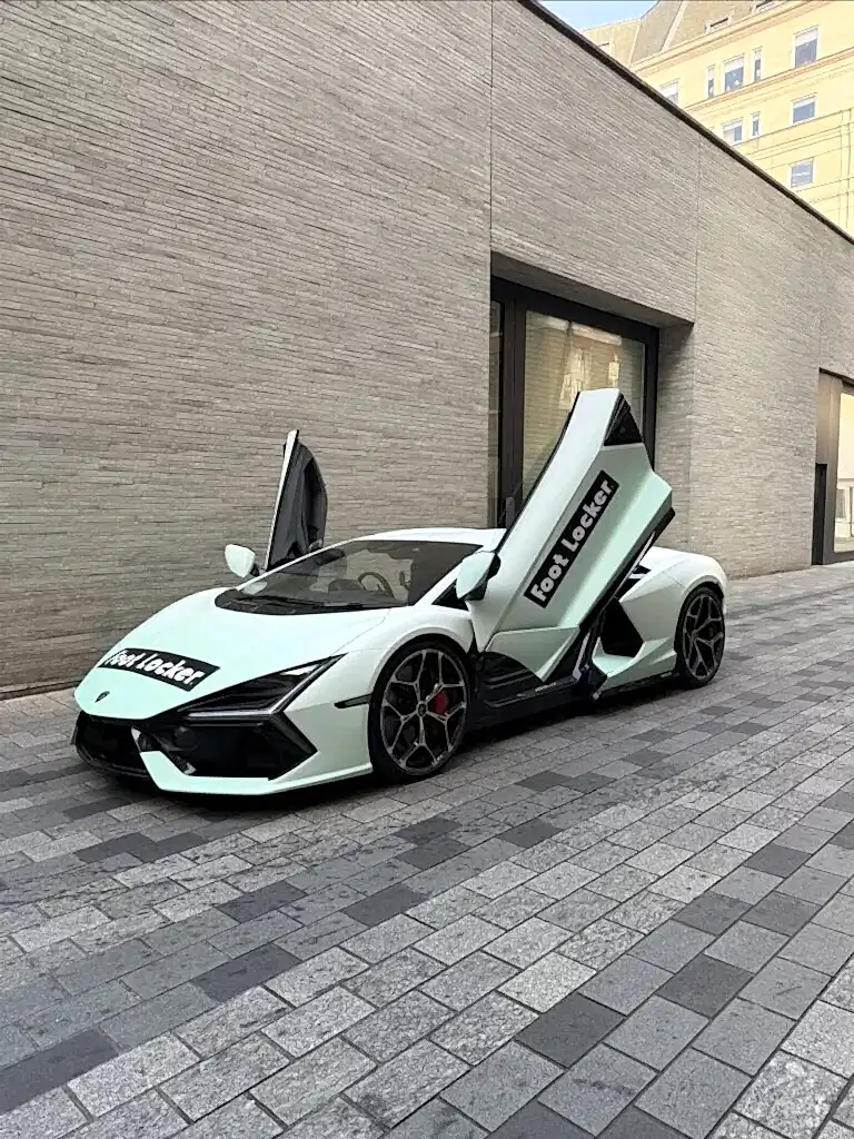 Lamborghini Revuelto in Foot Locker branding outside a London venue
